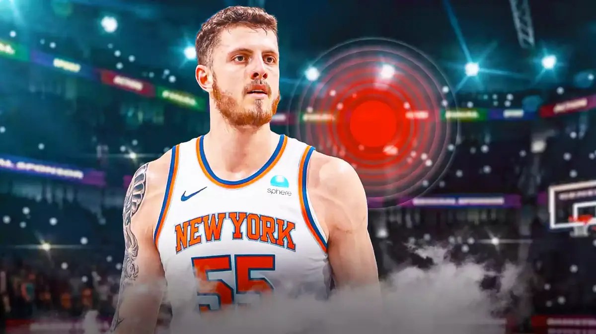 Isaiah Hartenstein (Knicks) looking serious with aching red symbol in the background
