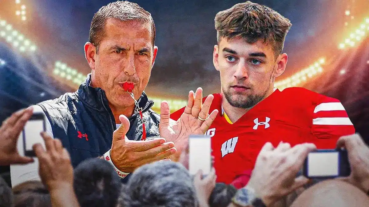 Photo: Tackett Curtis in Wisconsin uniform with Luke Fickell in Wisconsin gear, and Wisconsin logo in the background