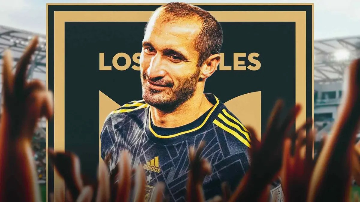 Giorgio Chiellini smiling in front of the LAFC logo