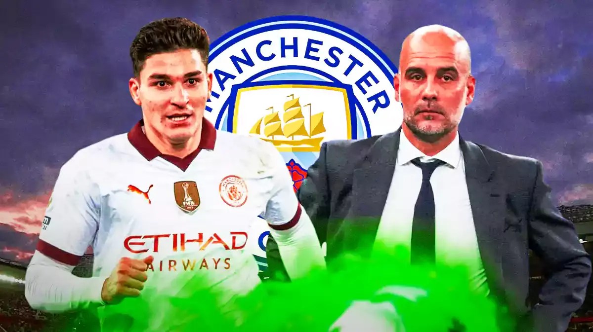 Julian Alveraz and Pep Guardiola in front of the Manchester City logo