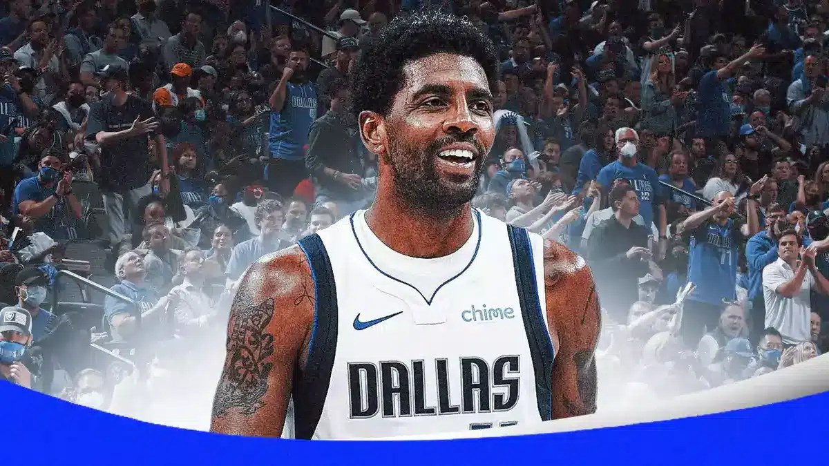 Mavericks' Kyrie Irving smiles at a fan from Ethiopia before the Mavs-Timberwolves game