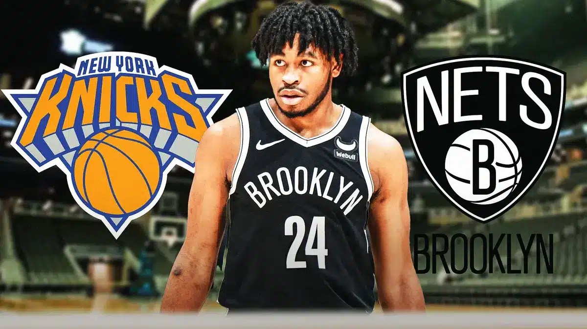 Cam Thomas in Nets jersey while Ben Simmons and New York Knicks players sit in the background