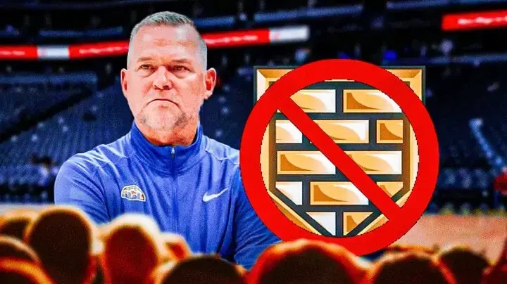 Michael Malone next to an NBA 2K badge