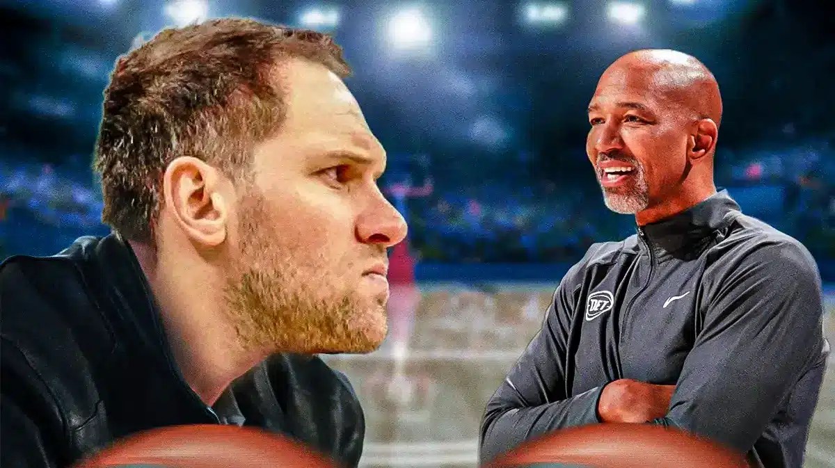 Pistons' Bojan Bogdanovic looking serious with Monty Williams smiling