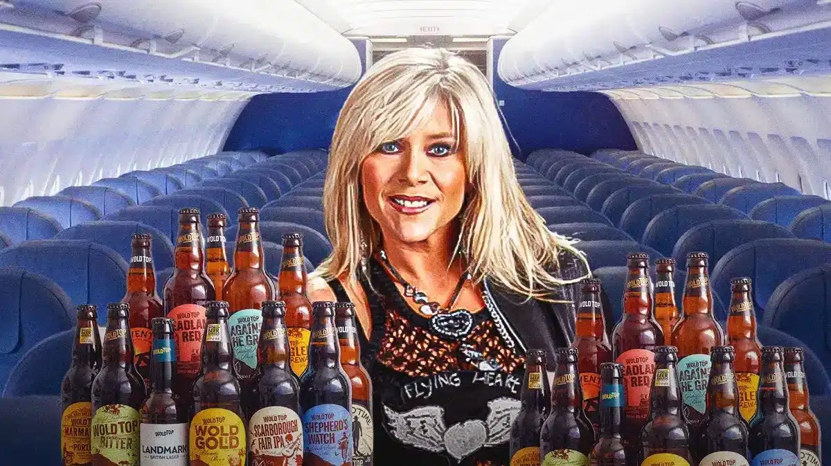 Samantha Fox surrounded by beer bottles on an airplane.