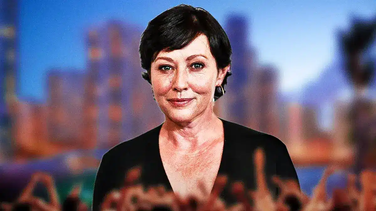 Shannen Doherty with a skyline behind her