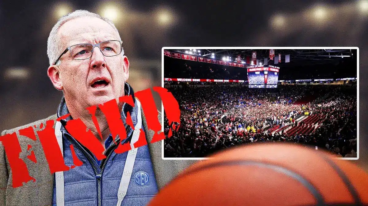 SEC Commissioner Greg Sankey looking at South Carolina basketball fans storming the court.