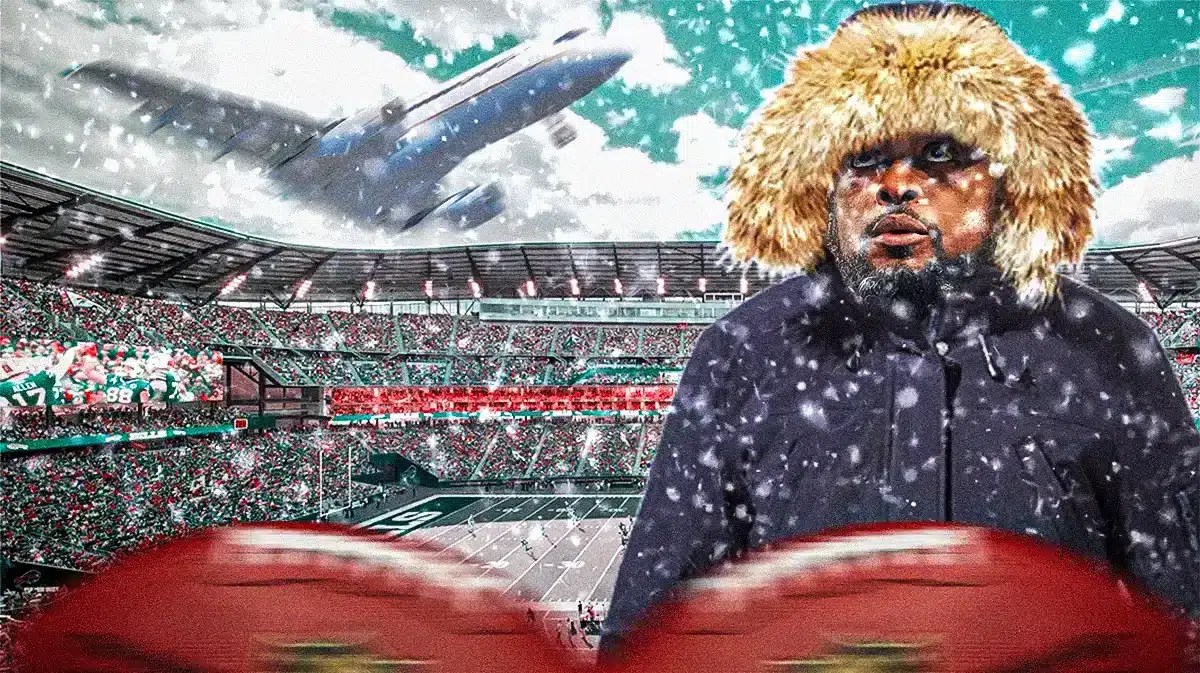 Steelers coach Mike Tomlin in front of the Buffalo Bills stadium with snow coming down