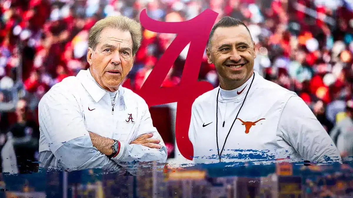 Photo: Steve Sarkisian next to Nick Saban in Alabama gear with Alabama logo in the back