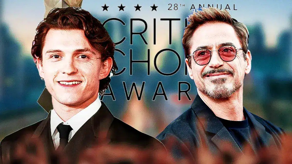 MCU stars Tom Holland and Robert Downey Jr. in front of Critics' Choice Awards logo.