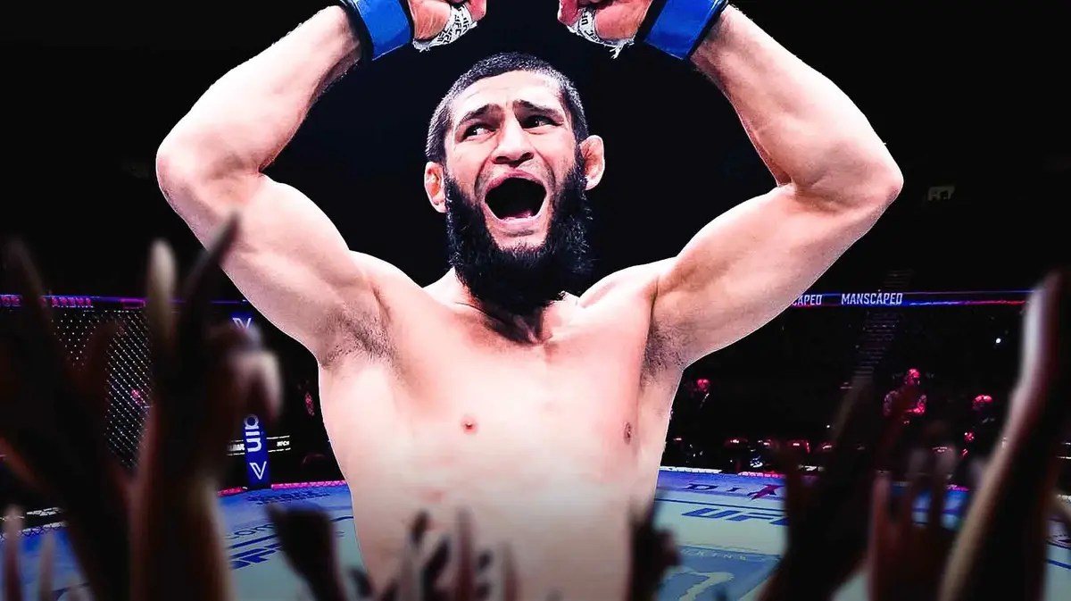 Khamzat Chimaev celebrating in the UFC cage