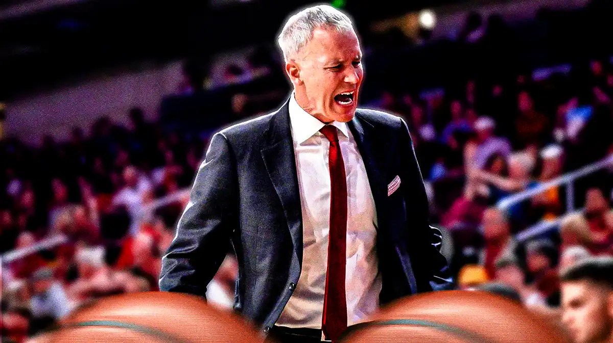 USC basketball coach Andy Enfield yelling on the sidelines.