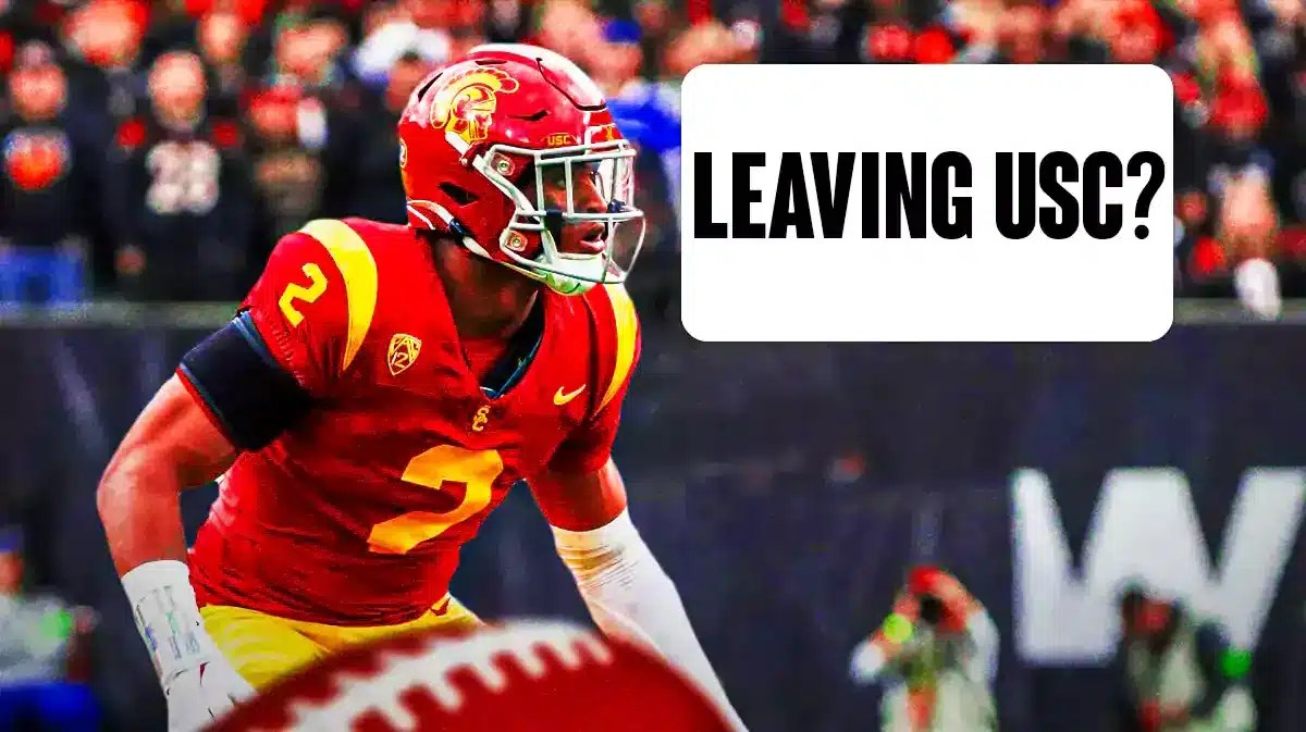 USC football’s Romello Height playing football. Place a sign next to him. On the sign, write the following: Leaving USC?