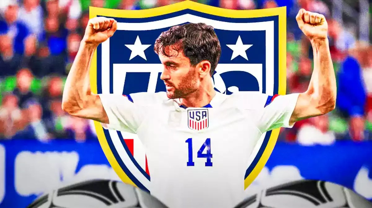 Luca De la Torre celebrating in front of the USMNT logo