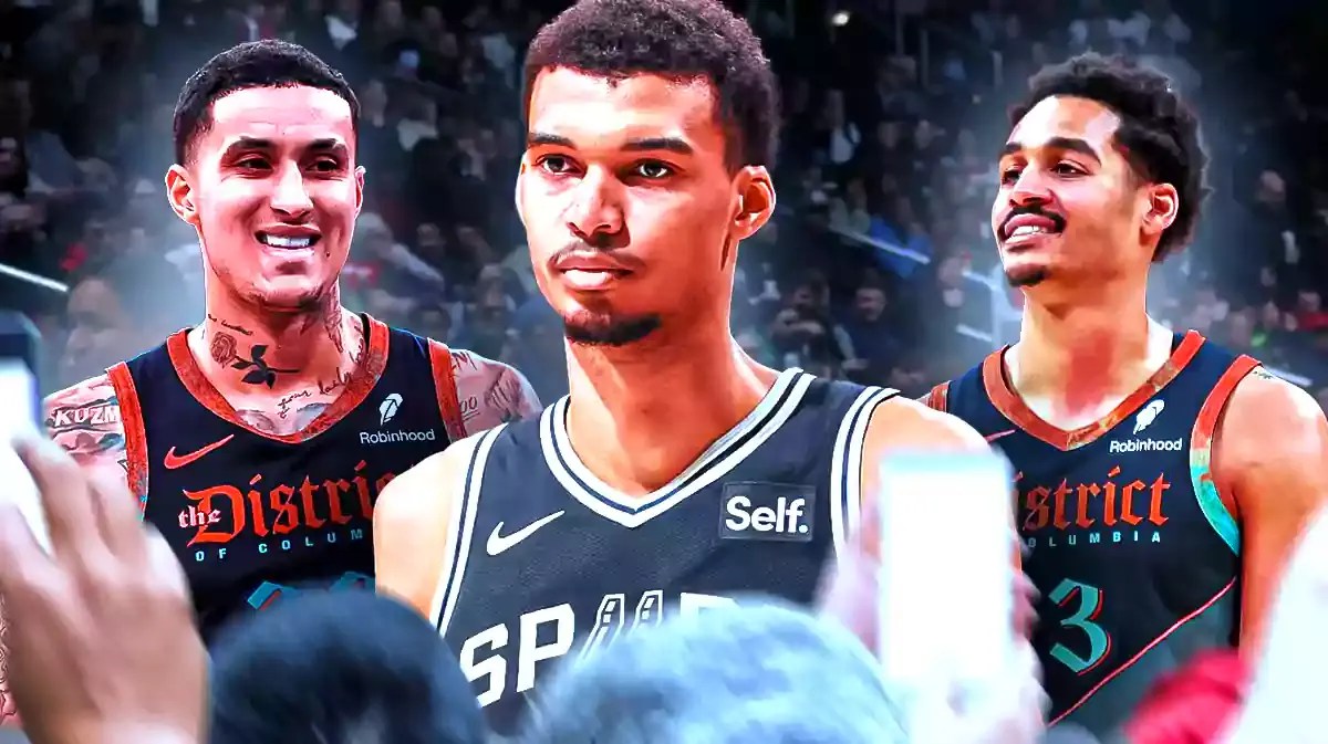 Spurs star Victor Wembanyama with Wizards players Jordan Poole and Kyle Kuzma.