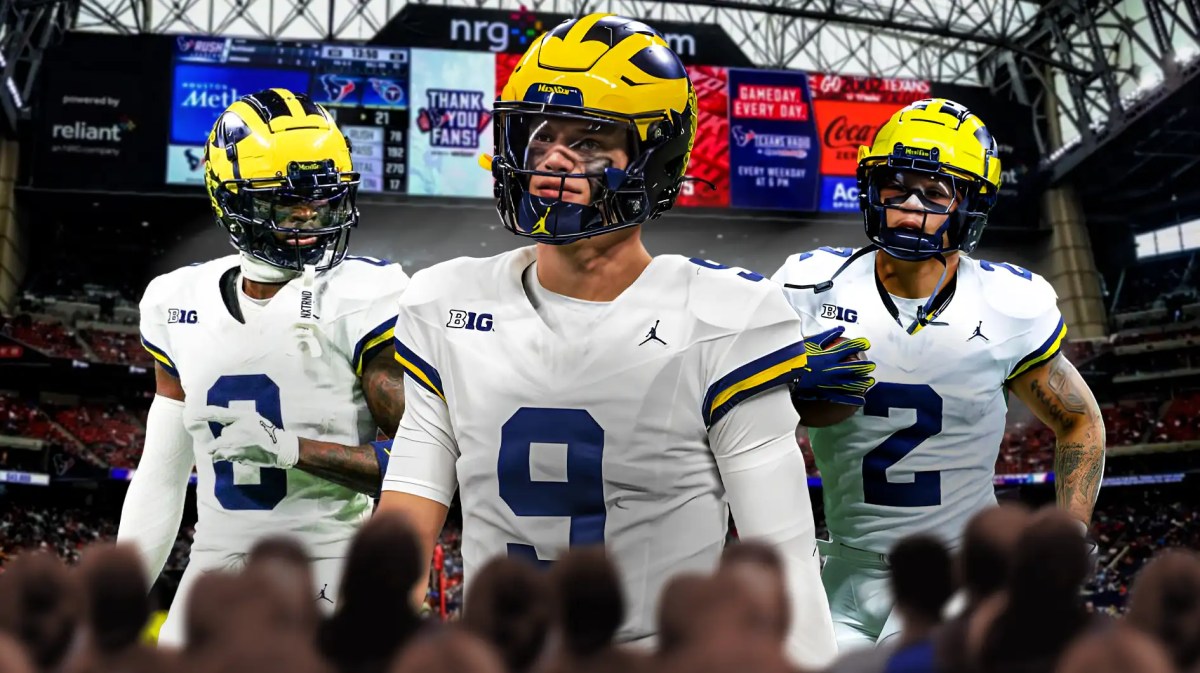 Michigan football, Washington football, Wolverines, Huskies, CFP National Championship, Mike Sainristil, JJ McCarthy and Blake Corum all in Michigan unis with NRG Stadium in the background