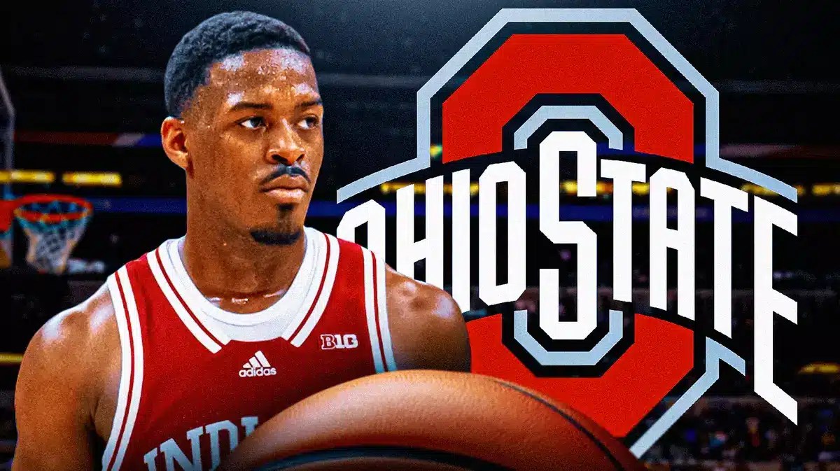 Photo: Xavier Johnson in Indiana uniform with Indiana and Ohio State logos behind him
