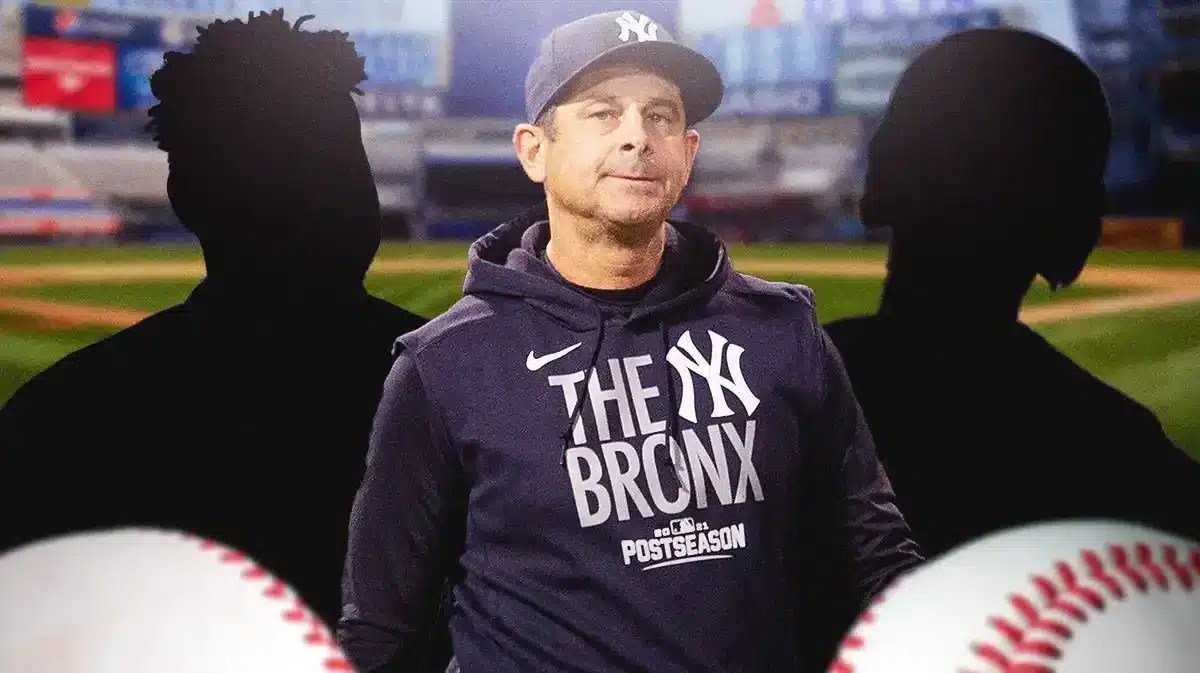 Aaron Boone. Jeter Downs and Oscar Gonzalez as silhouettes