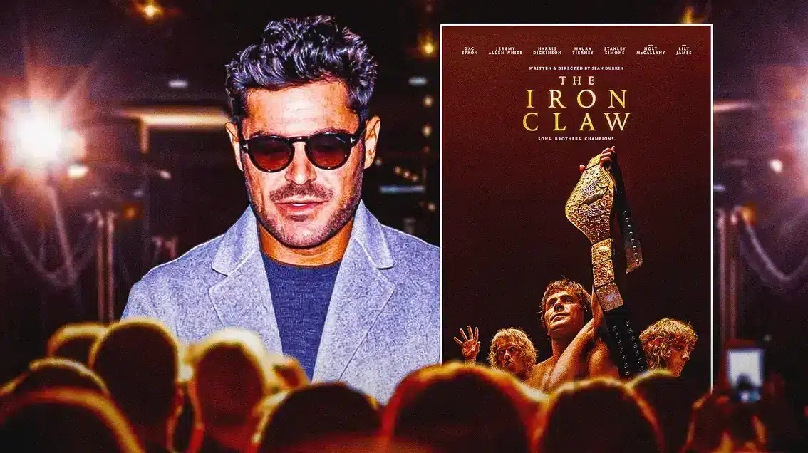 Zac Efron next to The Iron Claw poster.