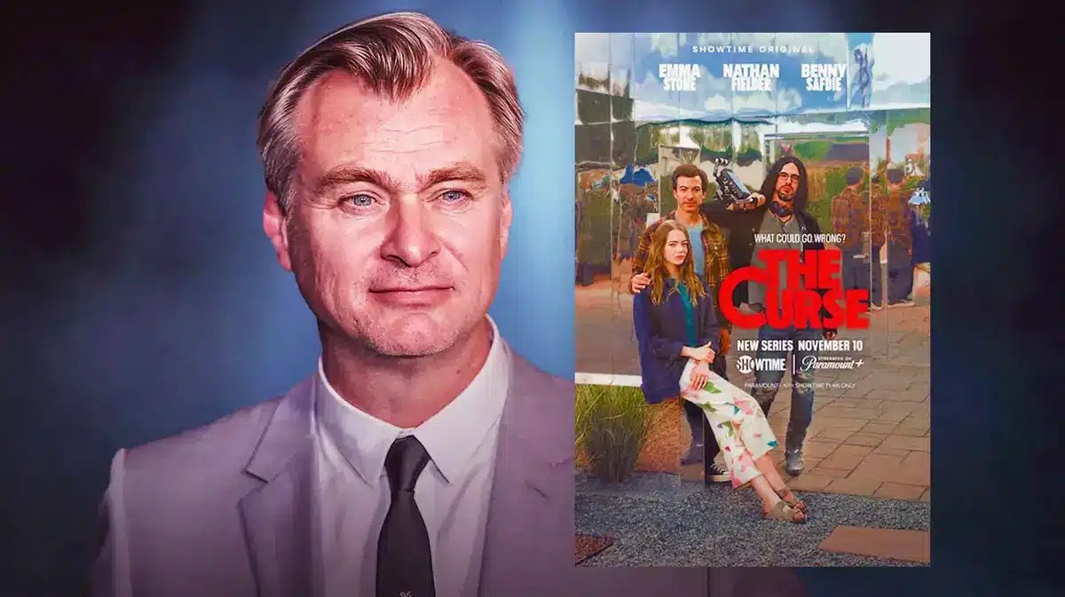 Christopher Nolan with a movie poster for The Curse.