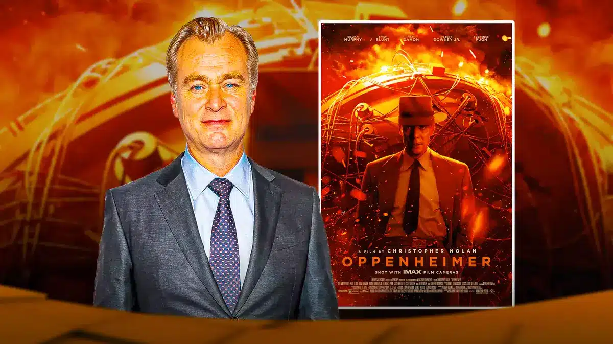 Christopher Nolan with Oppenheimer movie poster.