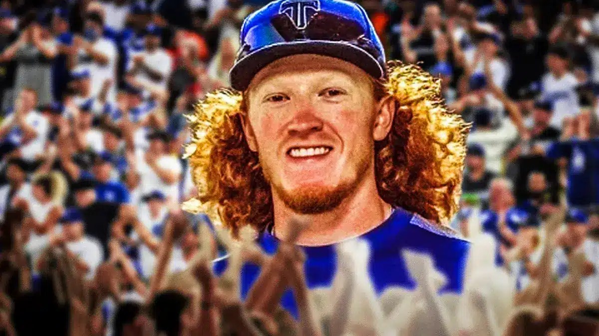 Dustin May smiling with Dodgers fans cheering