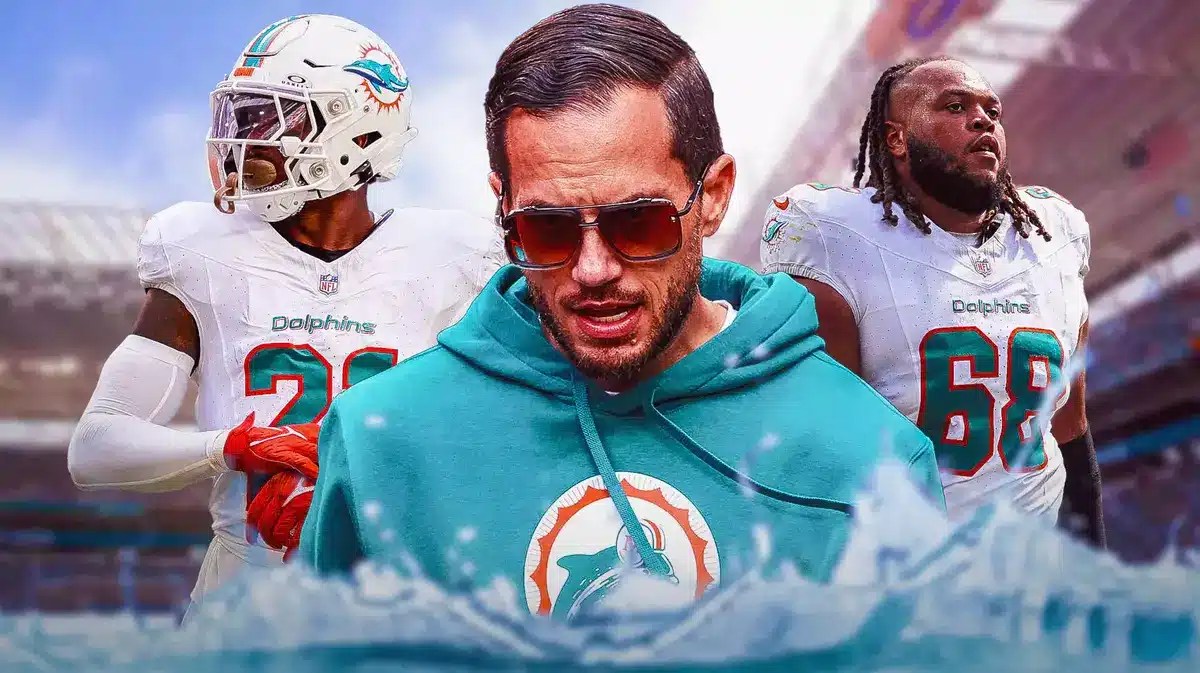Miami Dolphins stars Robert Hunt, DeShon Elliott, and head coach Mike McDaniel in front of Hard Rock Stadium.