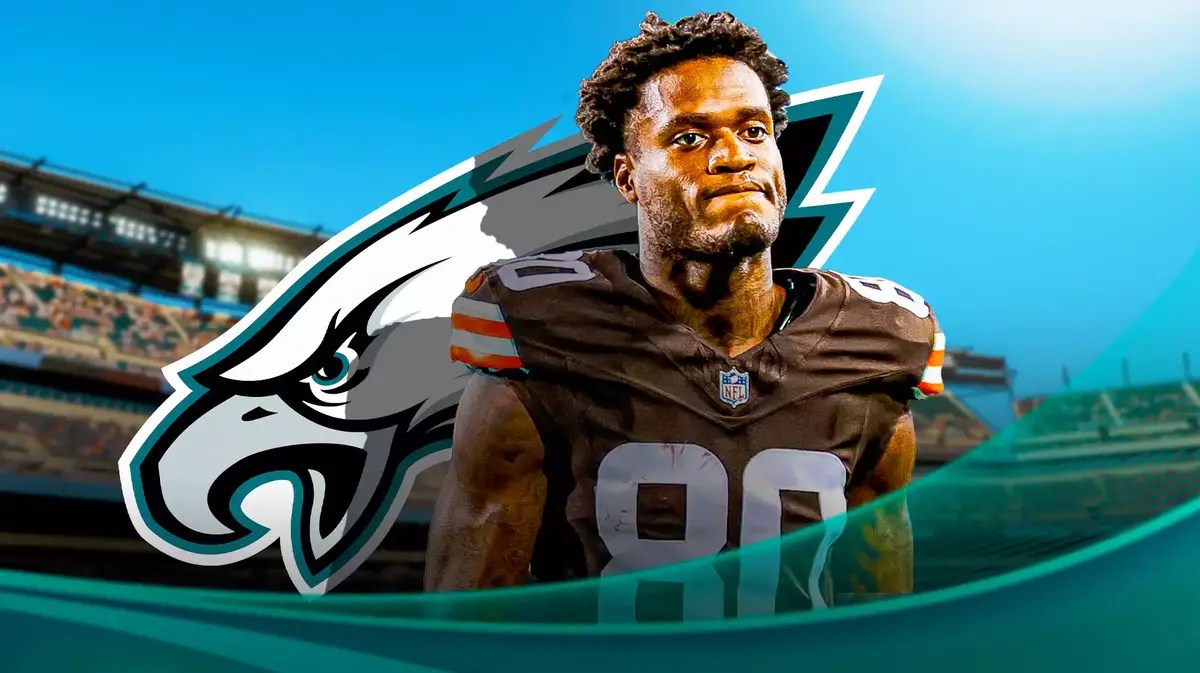 Former Browns WR Austin Watkins Jr. in front of Eagles logo, Devonta Smith and AJ Brown watching out of shot