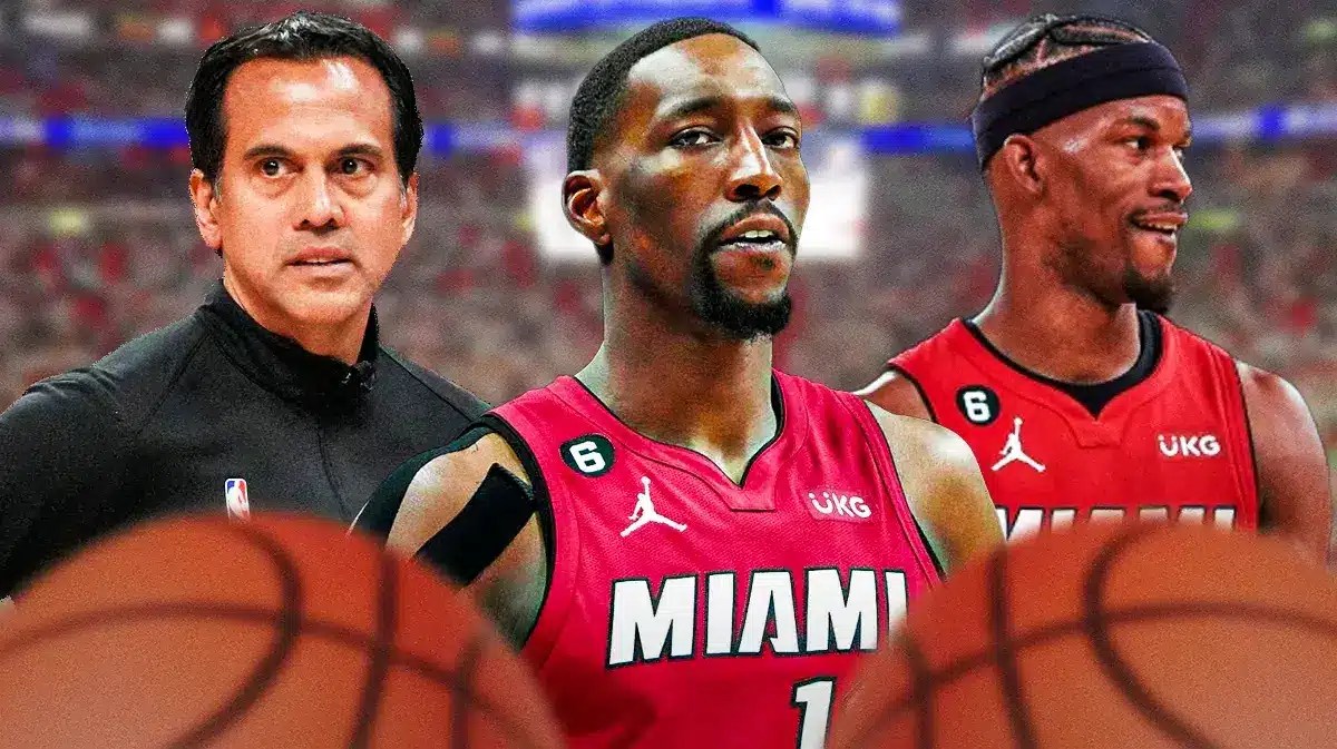Miami Heat stars Bam Adebayo, Jimmy Butler, and head coach Erik Spoelstra in front of the Kaseya Center.