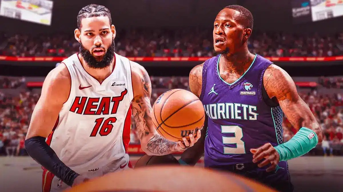 Miami Heat stars Caleb Martin and Terry Rozier in front of the Kaseya Center.