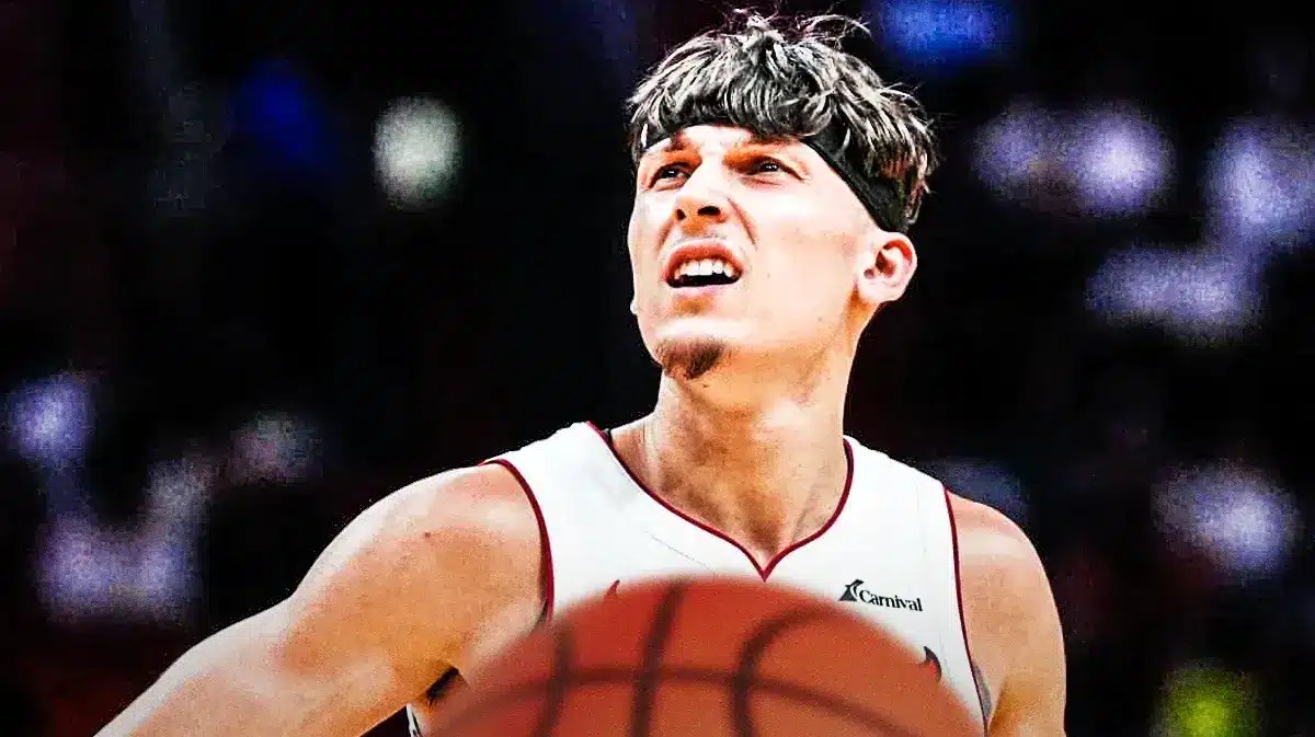 Miami Heat star Tyler Herro in front of the Kaseya Center.