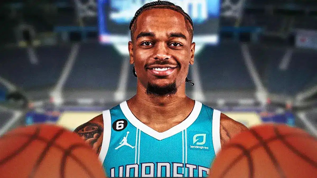 Charlotte Hornets star PJ Washington in front of the Spectrum Center.