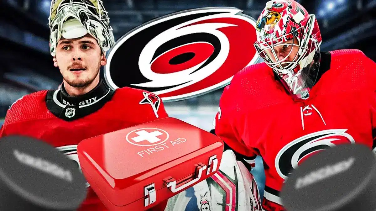 Pyotr Kochetkov in middle looking stern with first aid kit, Antti Raanta in background of image looking hopeful, CAR Hurricanes logo, hockey rink in background