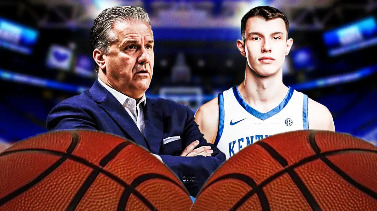 John Calipari alongside Zvonimir Ivisic in a Kentucky jersey with the Kentucky arena in the background