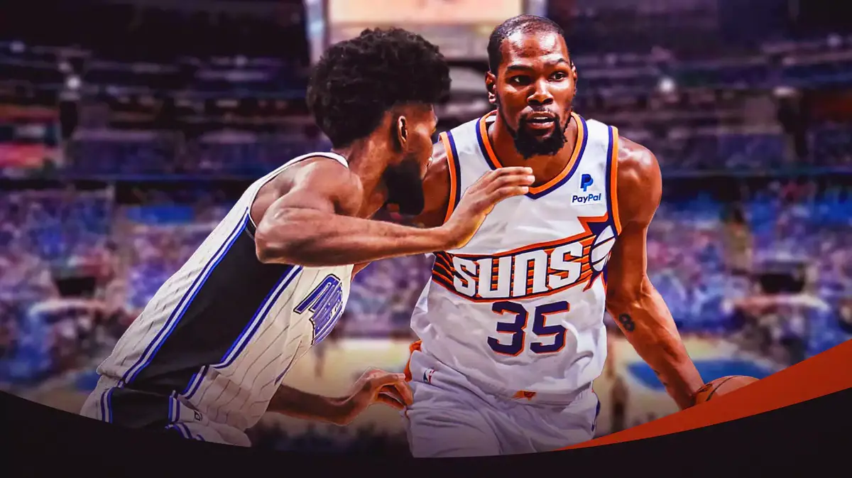 Magic F Jonathan Isaac guarding Suns Kevin Durant in the KIA Center.