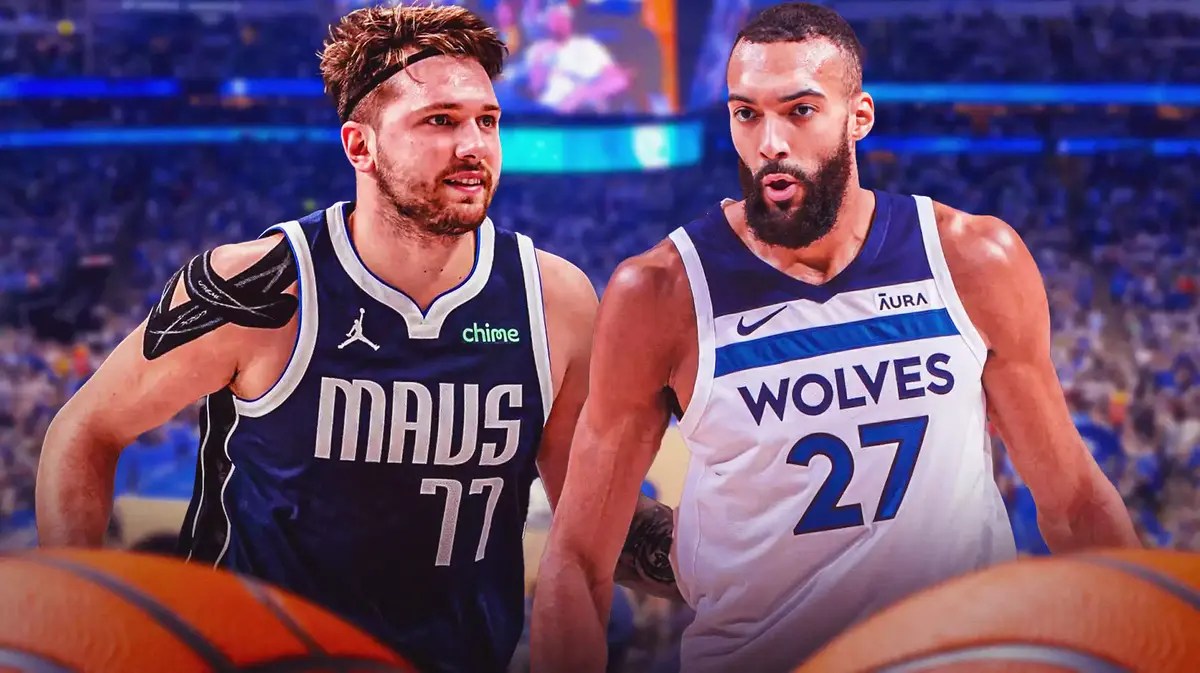 Mavs star Luka Doncic smiling next to Rudy Gobert
