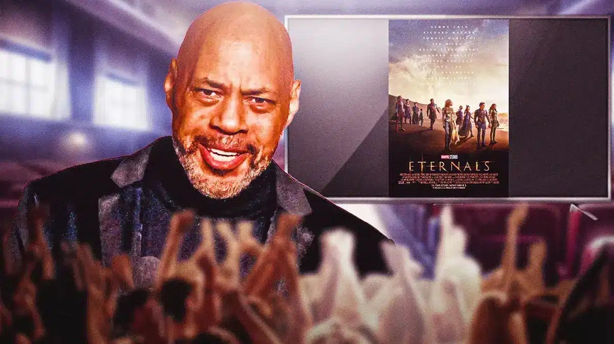 John Ridley next to MCU Eternals poster on TV.