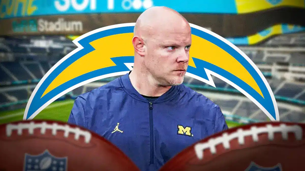 Michigan football assistant Ben Herbert, Chargers logo behind him.