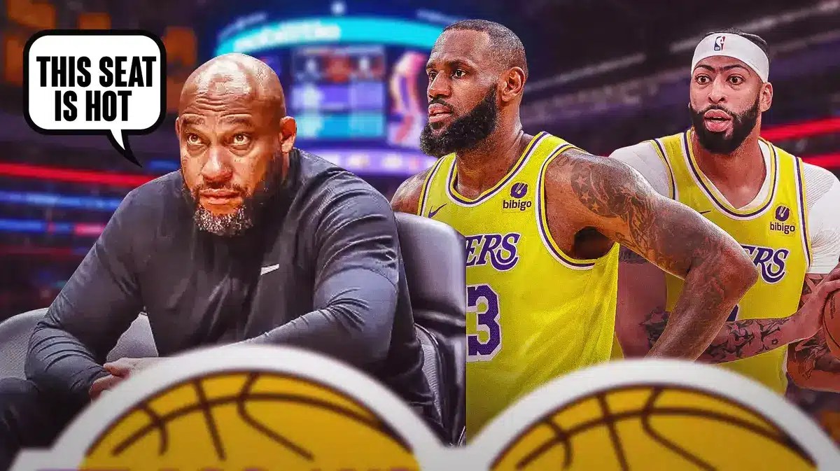 Lakers' Darvin Ham sitting down on a chair. Have Ham saying the following: This seat is hot Place Lakers' LeBron James, Lakers' Anthony Davis in background looking serious.