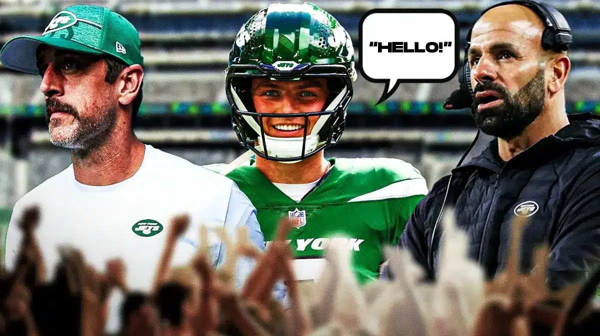 Jets Aaron Rodgers and Robert Saleh next to Zach Wilson saying hello at Metlife Stadium