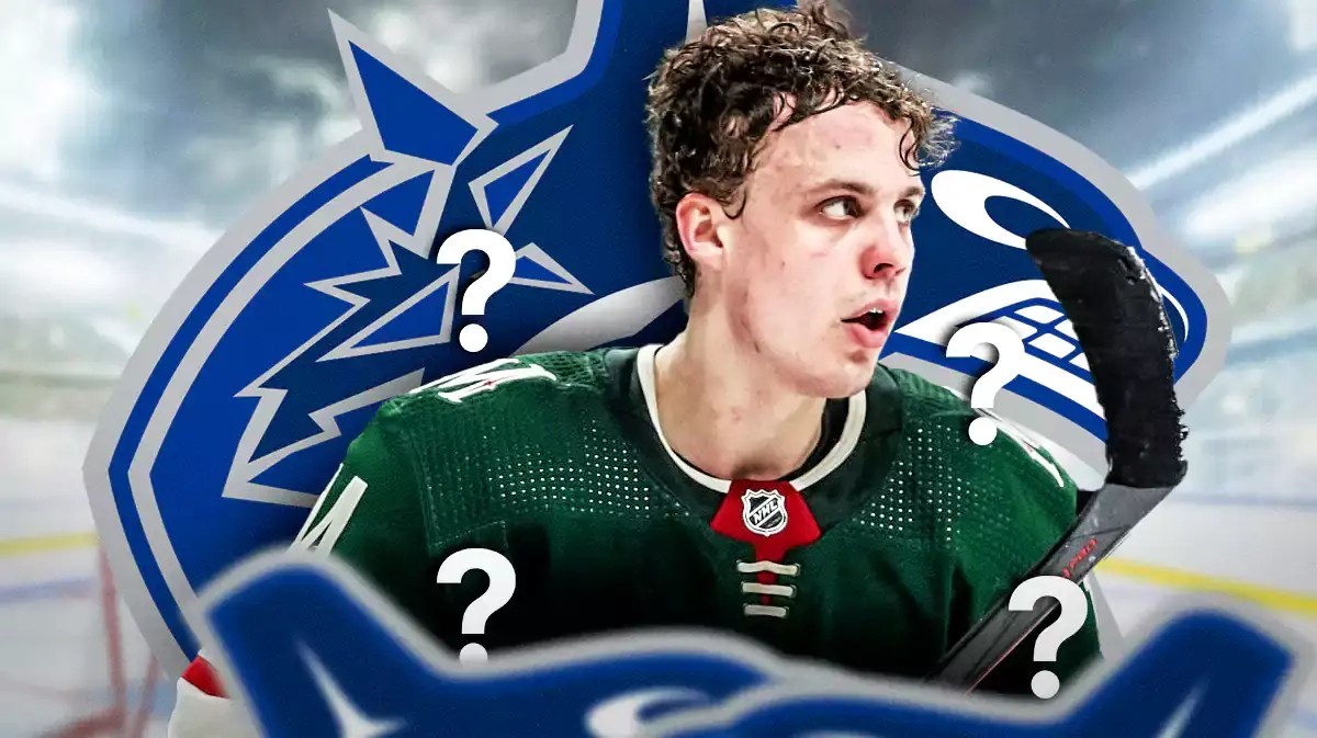 Joel Eriksson Ek in middle of image looking stern, VAN Canucks logo, a few question marks, hockey rink in background