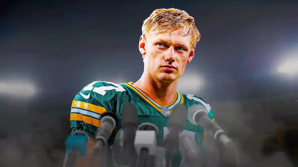 Packers kicker Anders Carlson looking upset at the podium