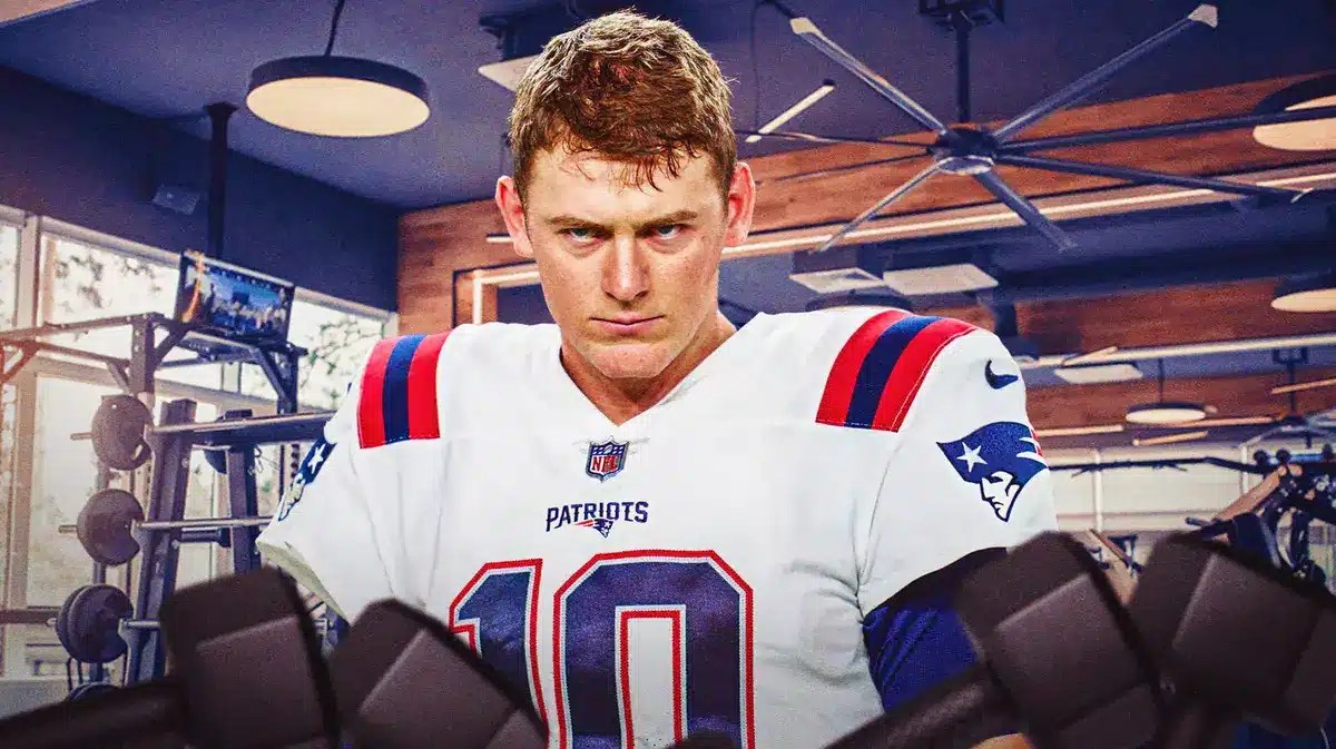 Photo: Mac Jones in Patriots uniform with gym weights and treadmill in the back