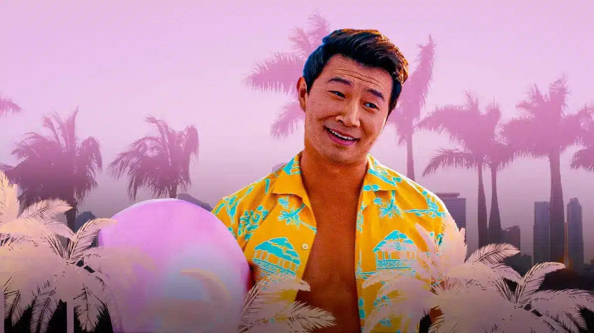 Simu Liu with a Barbie background.