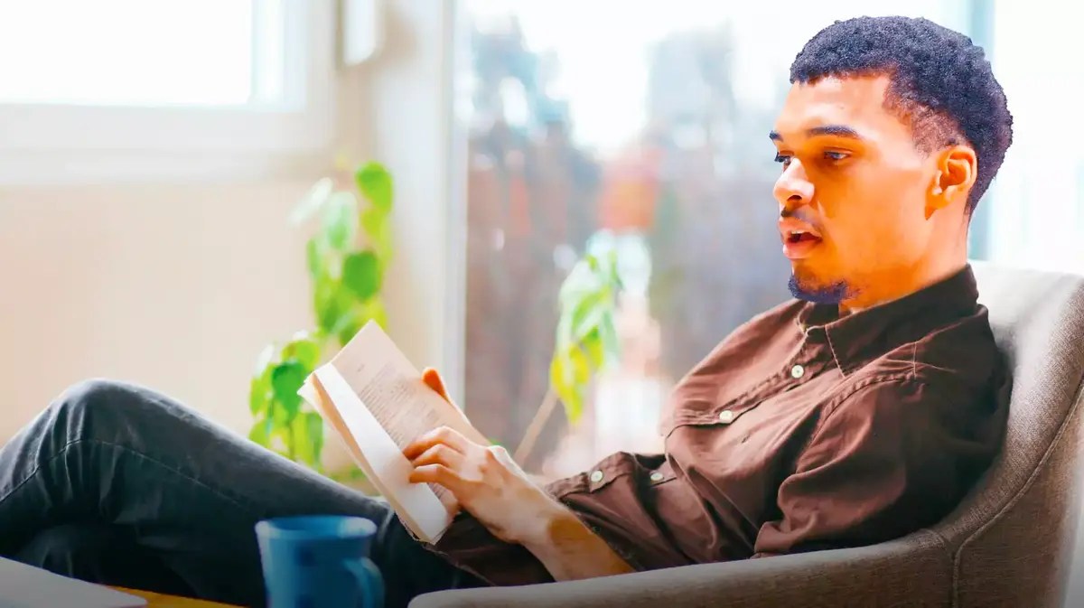 Spurs star Victor Wembanyama reading a book