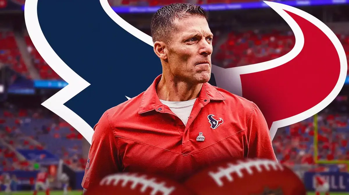 Photo: Nick Caserio with Patriots logo behind him