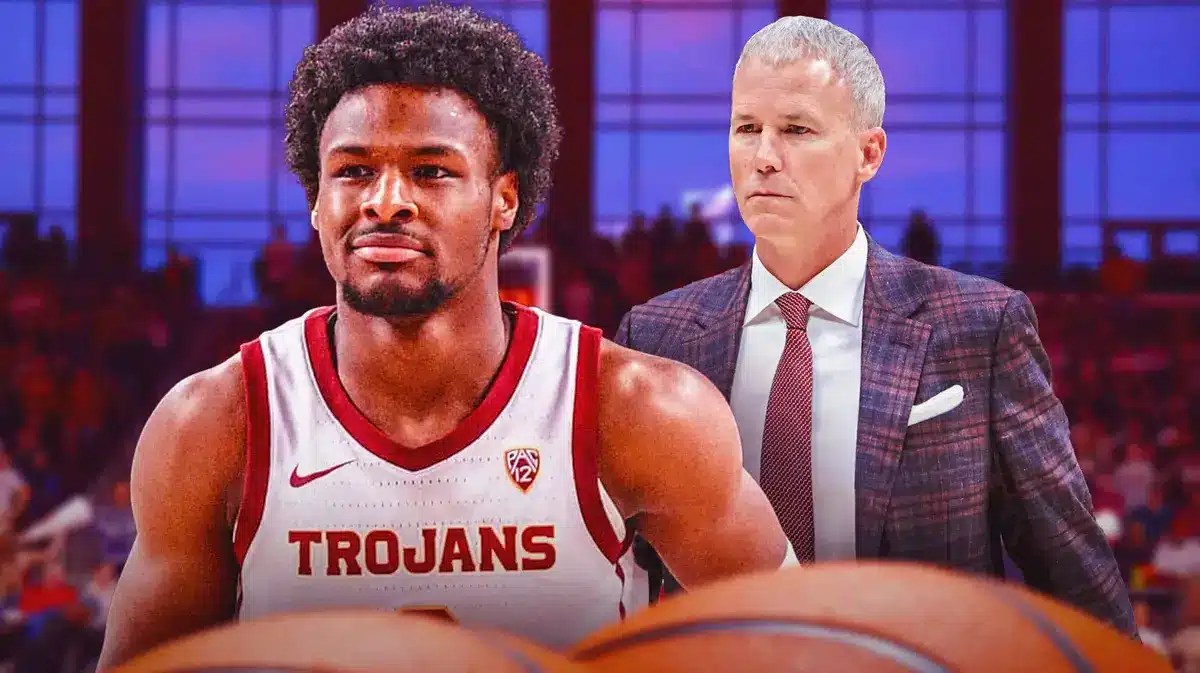 USC basketball's Bronny James and head coach Andy Enfield in front of the Galen Center.