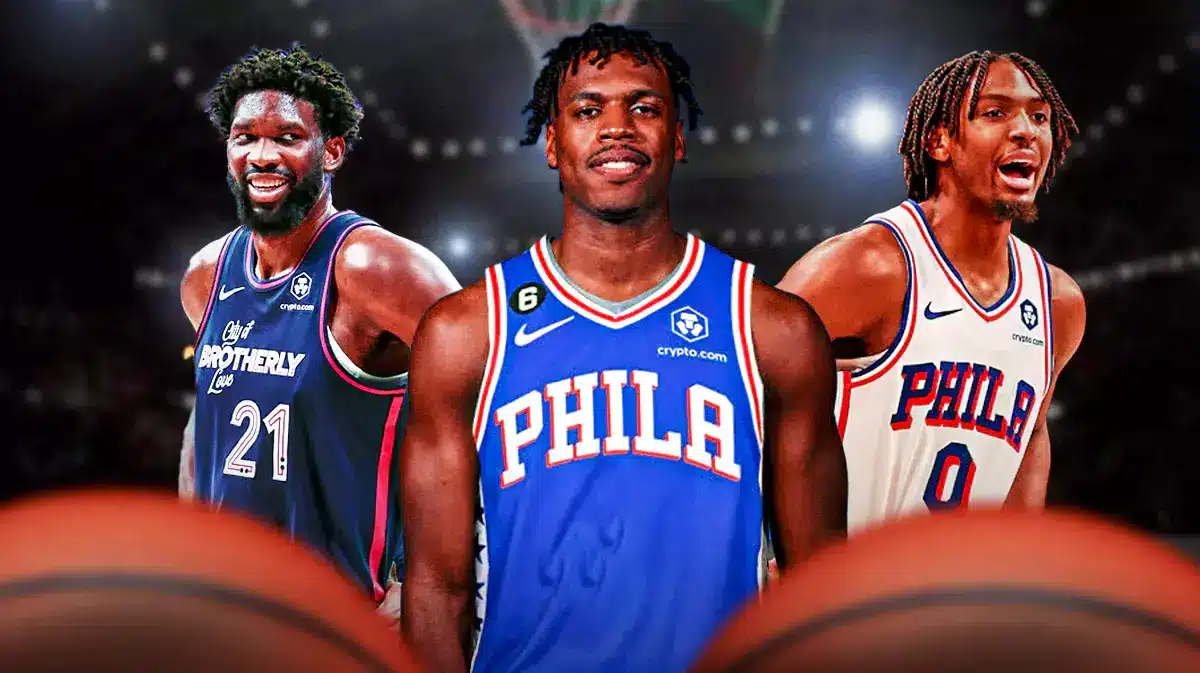 Buddy Hield next to Tyrese Maxey and Joel Embiid