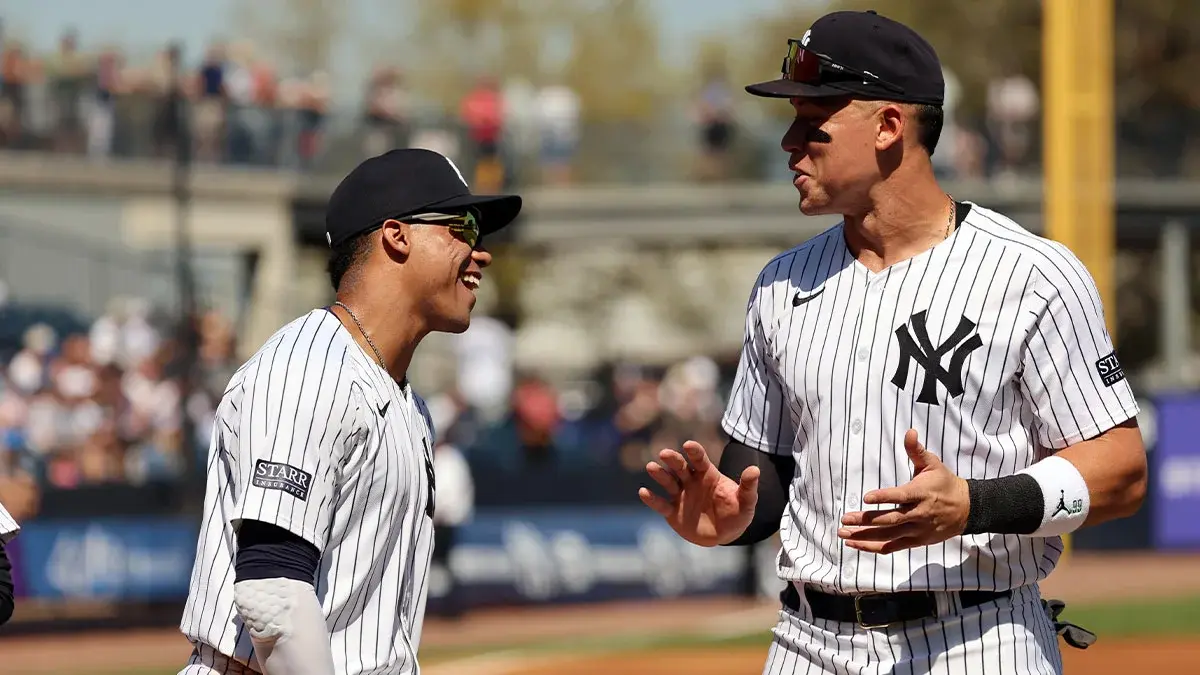 New York Yankees left fielder Juan Soto (22) and right fielder Aaron Judge (99) talks prior to the game against the Toronto Blue Jays at George M. Steinbrenner Field.