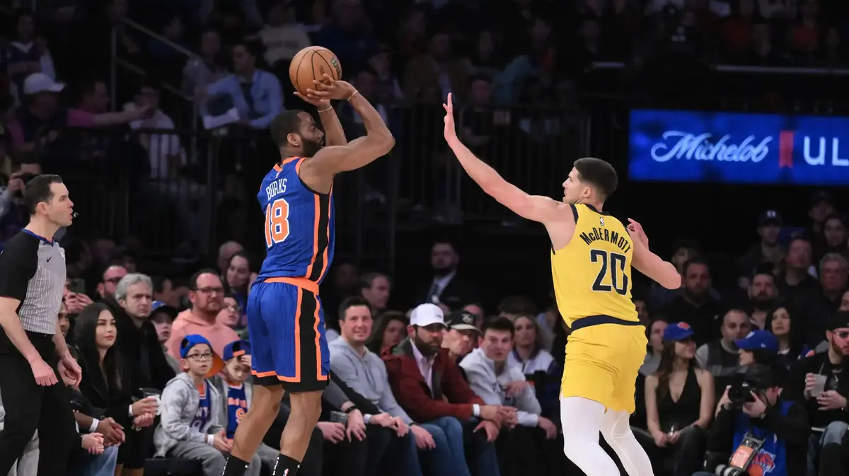 New York Knicks guard Alec Burks (18) shoots the ball as Indiana Pacers forward Doug McDermott (20) defends during the second quarter at Madison Square Garden